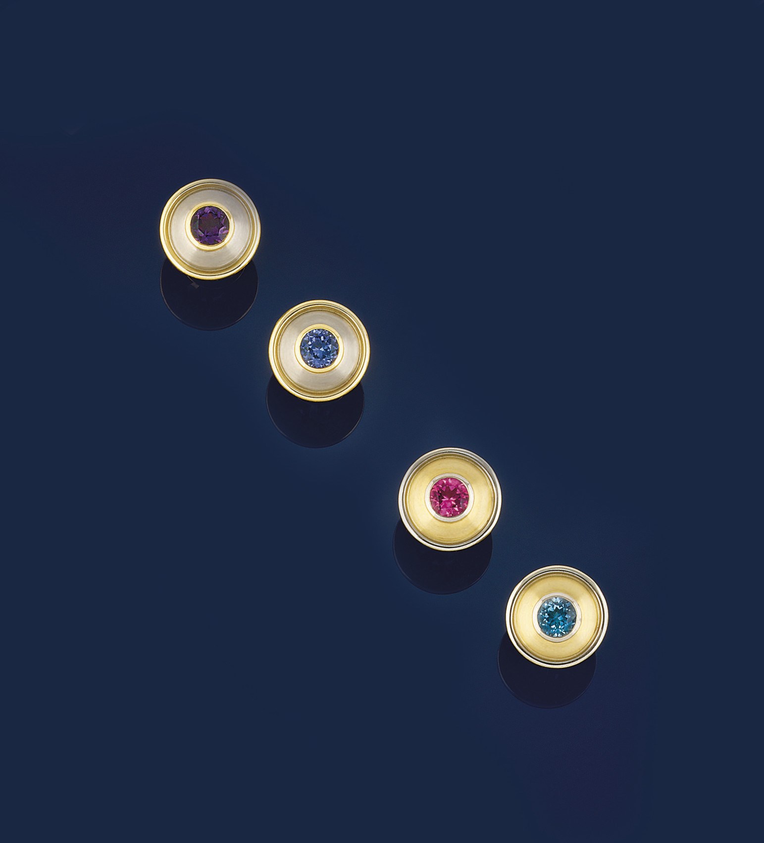Two pairs of vari-gem cufflinks