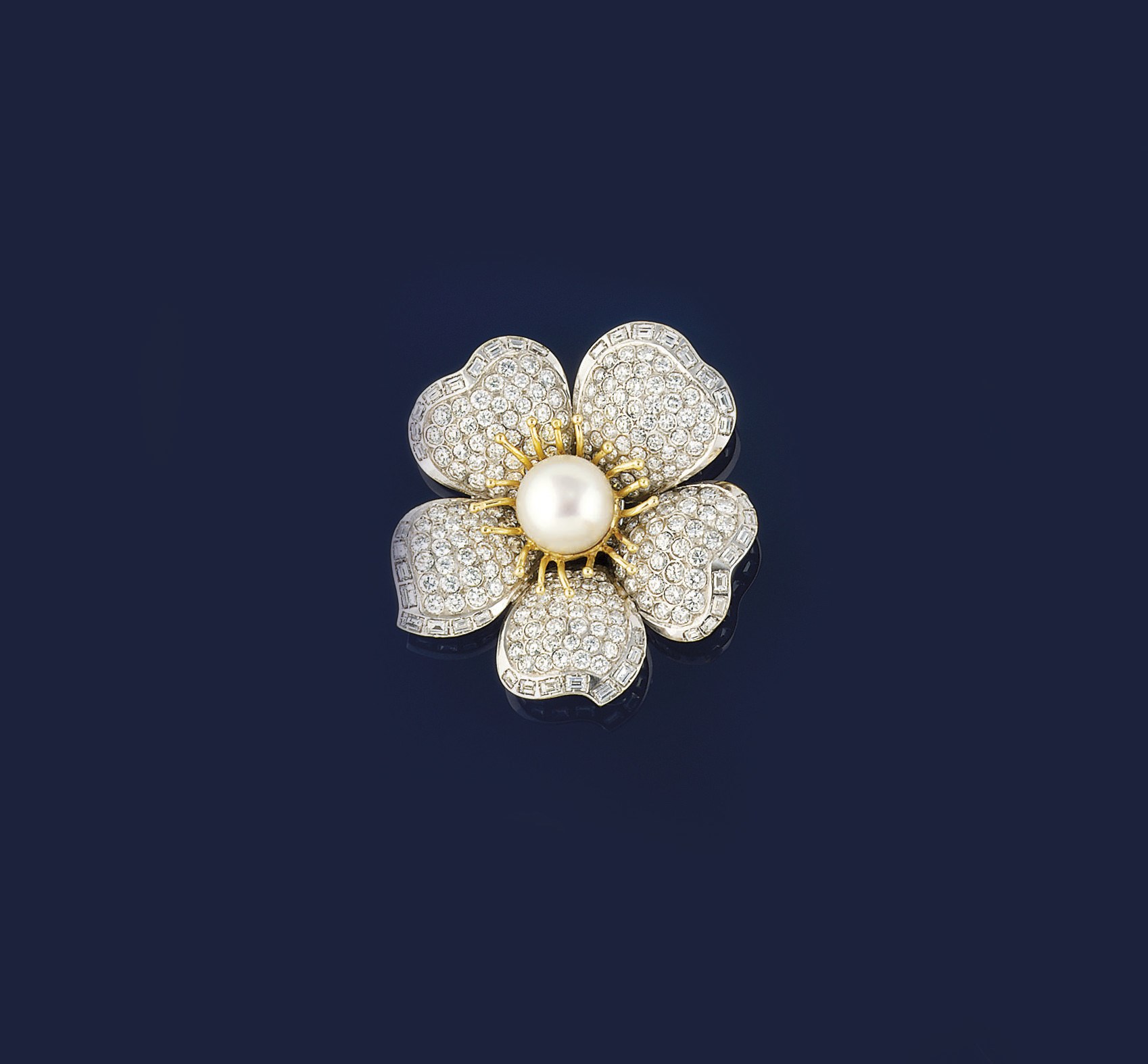 A cultured pearl and diamond flower brooch