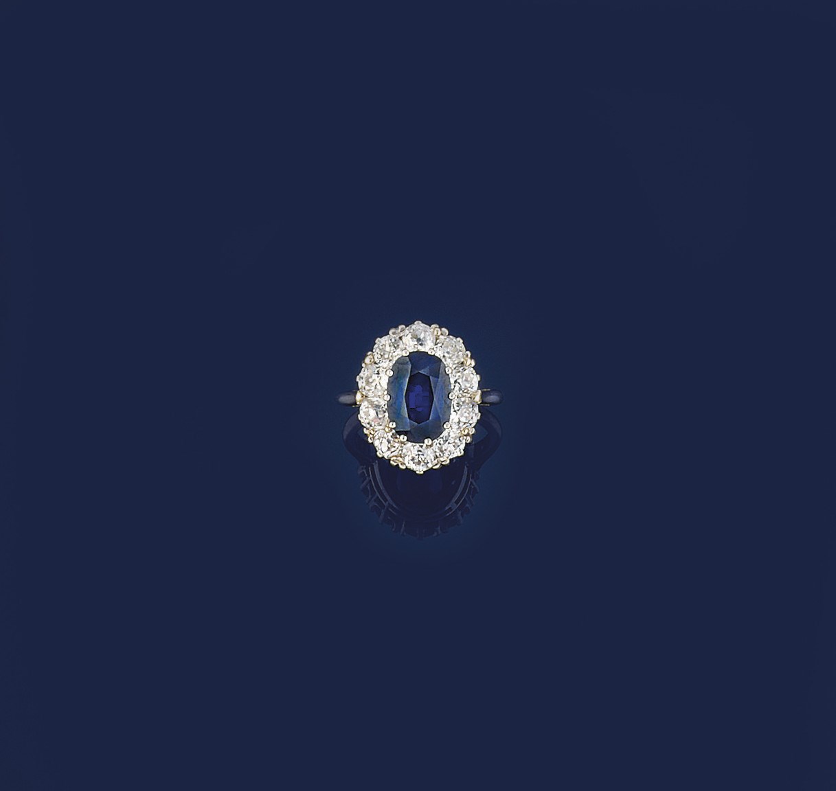 A sapphire and diamond cluster ring