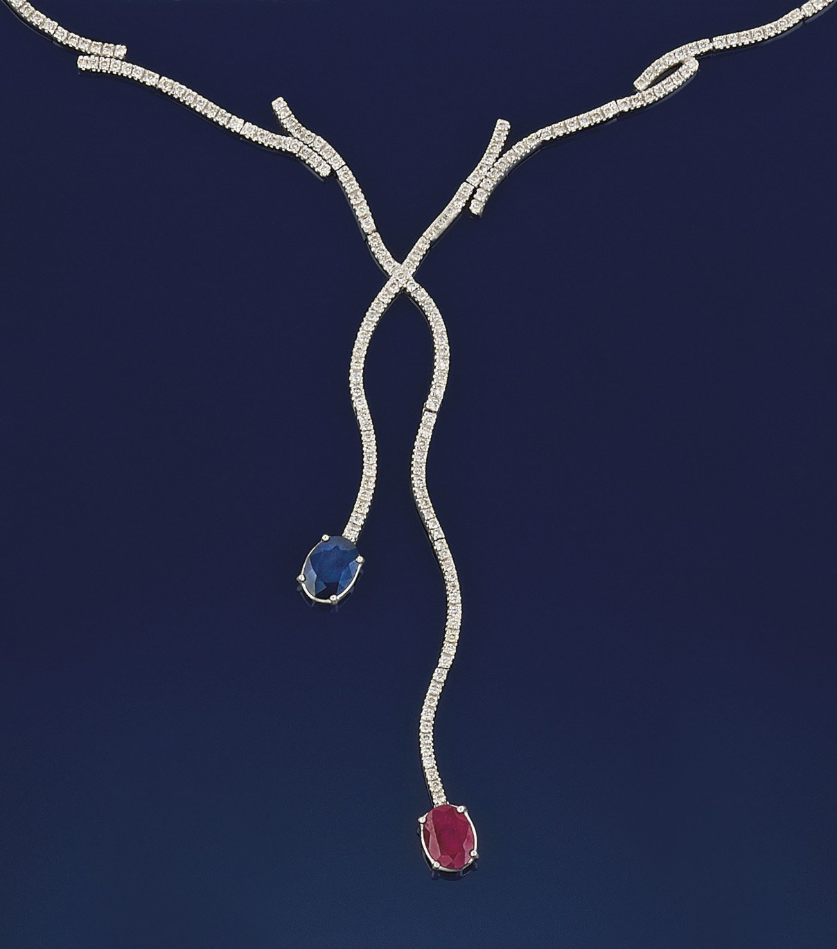 A diamond sapphire and ruby necklace