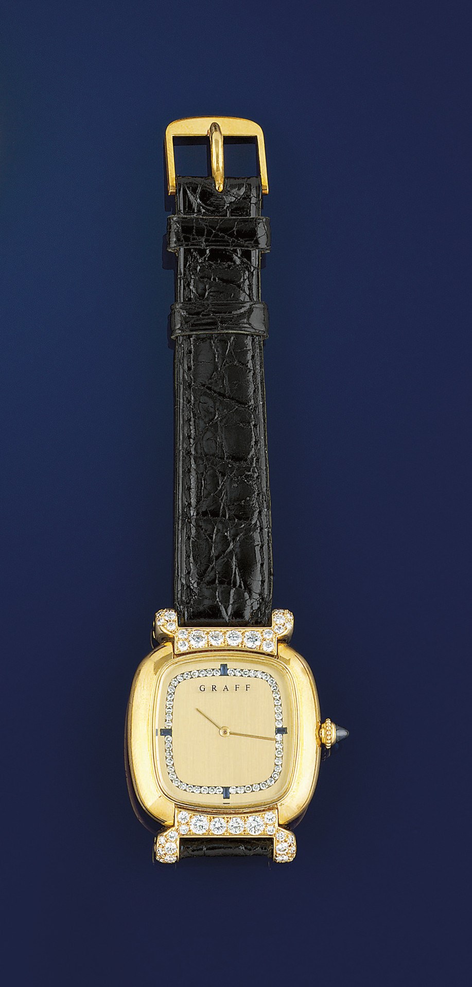 A DIAMOND AND SAPPHIRE SET WRISTWATCH, BY GRAFF