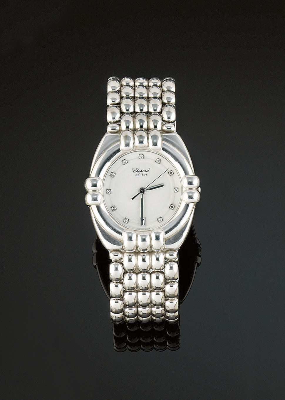 A QUARTZ "GSTAAD" WRISTWATCH, BY CHOPARD