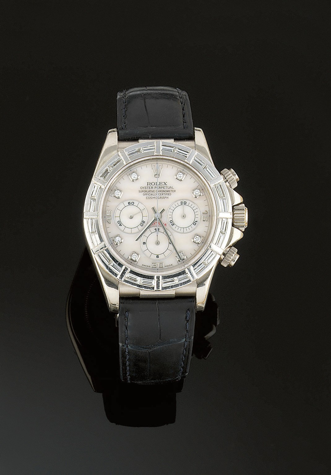 A DIAMOND SET AUTOMATIC "COSMOGRAPH DAYTONA" WRISTWATCH, BY ROLEX