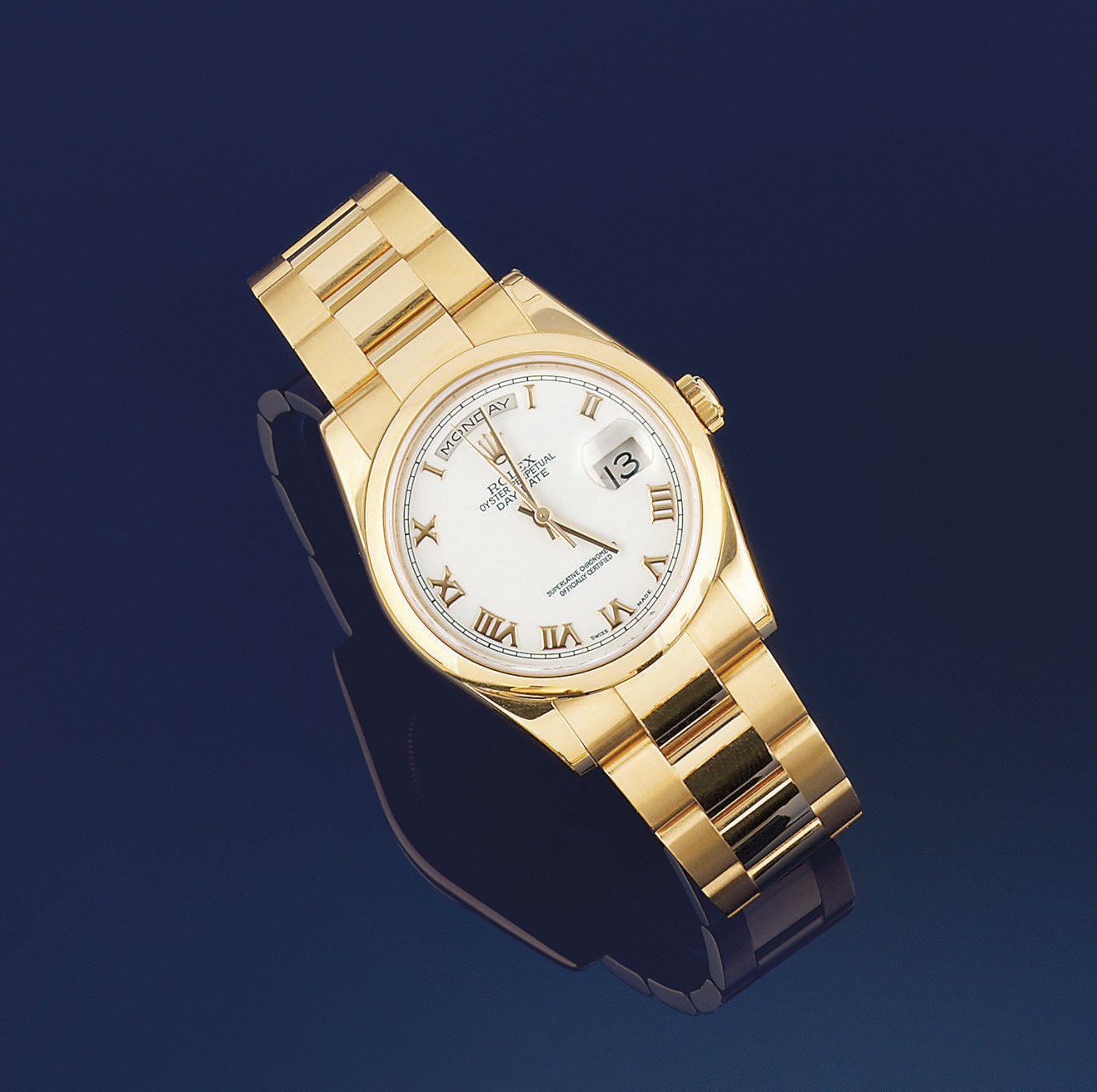 A midsize 18ct gold automatic 'Day-date' wristwatch, by Rolex