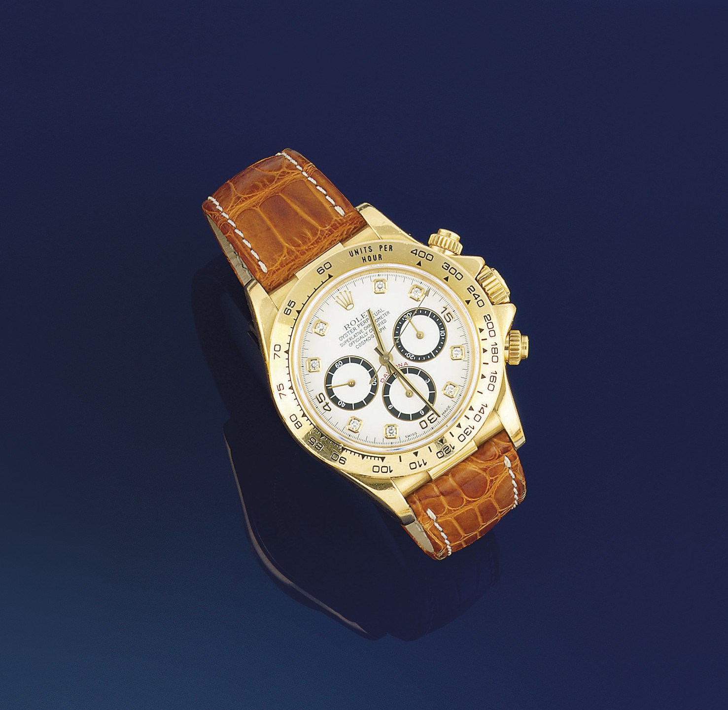 AN 18CT. GOLD AUTOMATIC "COSMOGRAPH DAYTONA" WRISTWATCH, BY ROLEX