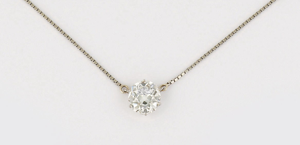 A diamond single stone pendant necklace