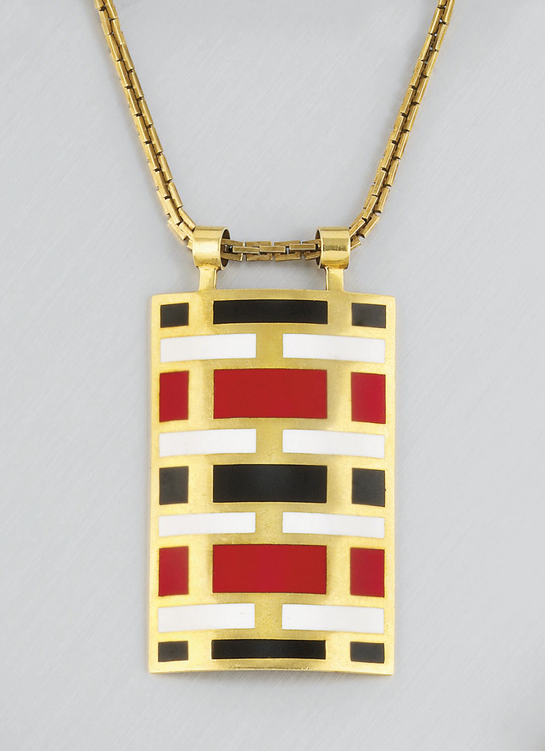 An enamelled pendant, by Cartier