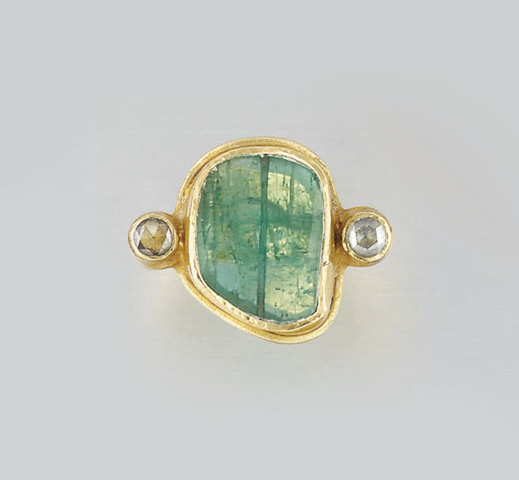 AN EMERALD AND DIAMOND RING