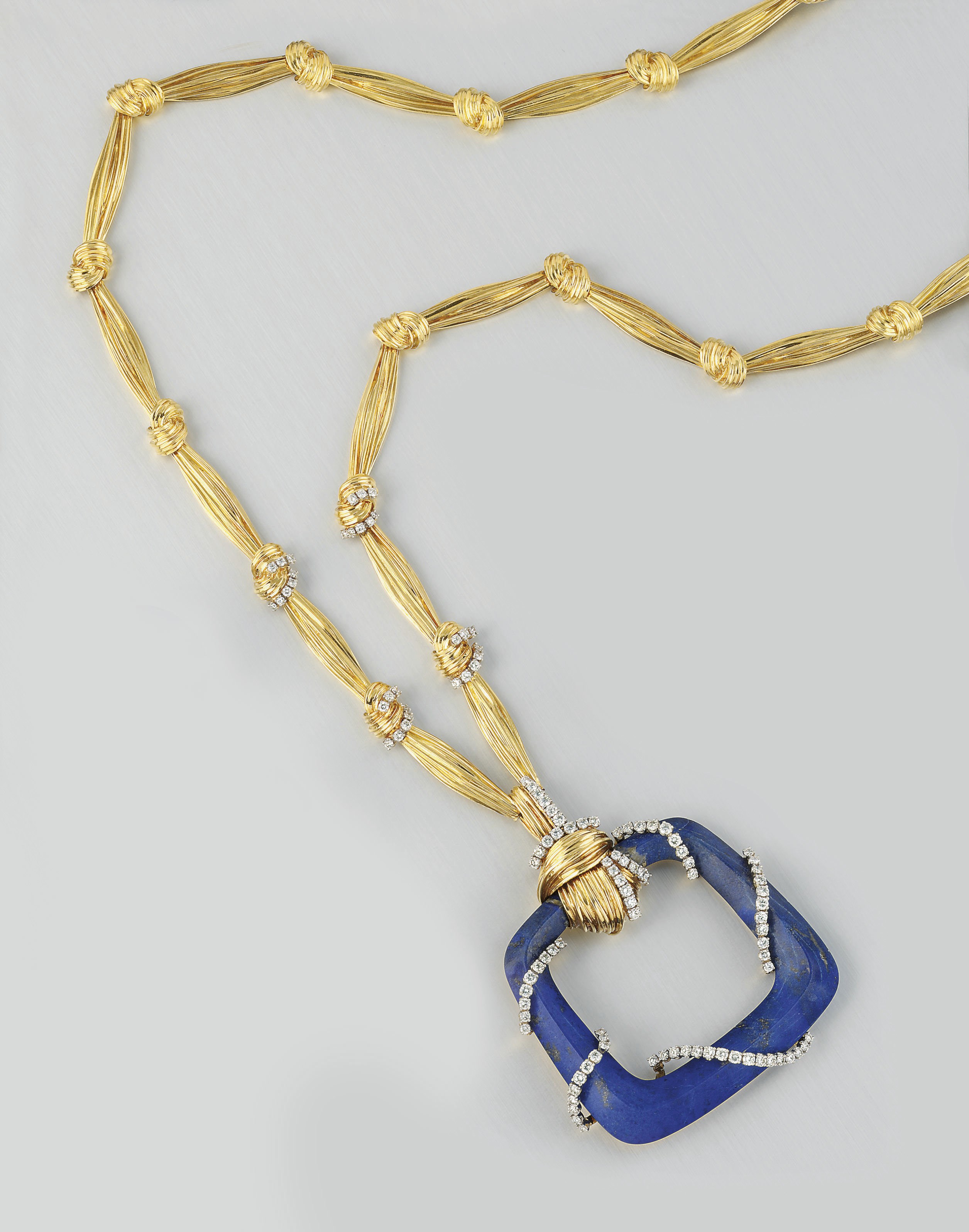 An impressive French diamond and lapis lazuli pendant necklace