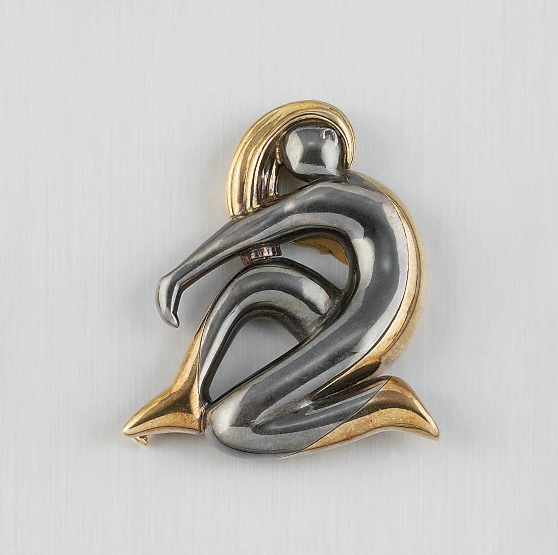 A BI-METALLIC FIGURAL BROOCH/PENDANT, BY RENE BOIVIN