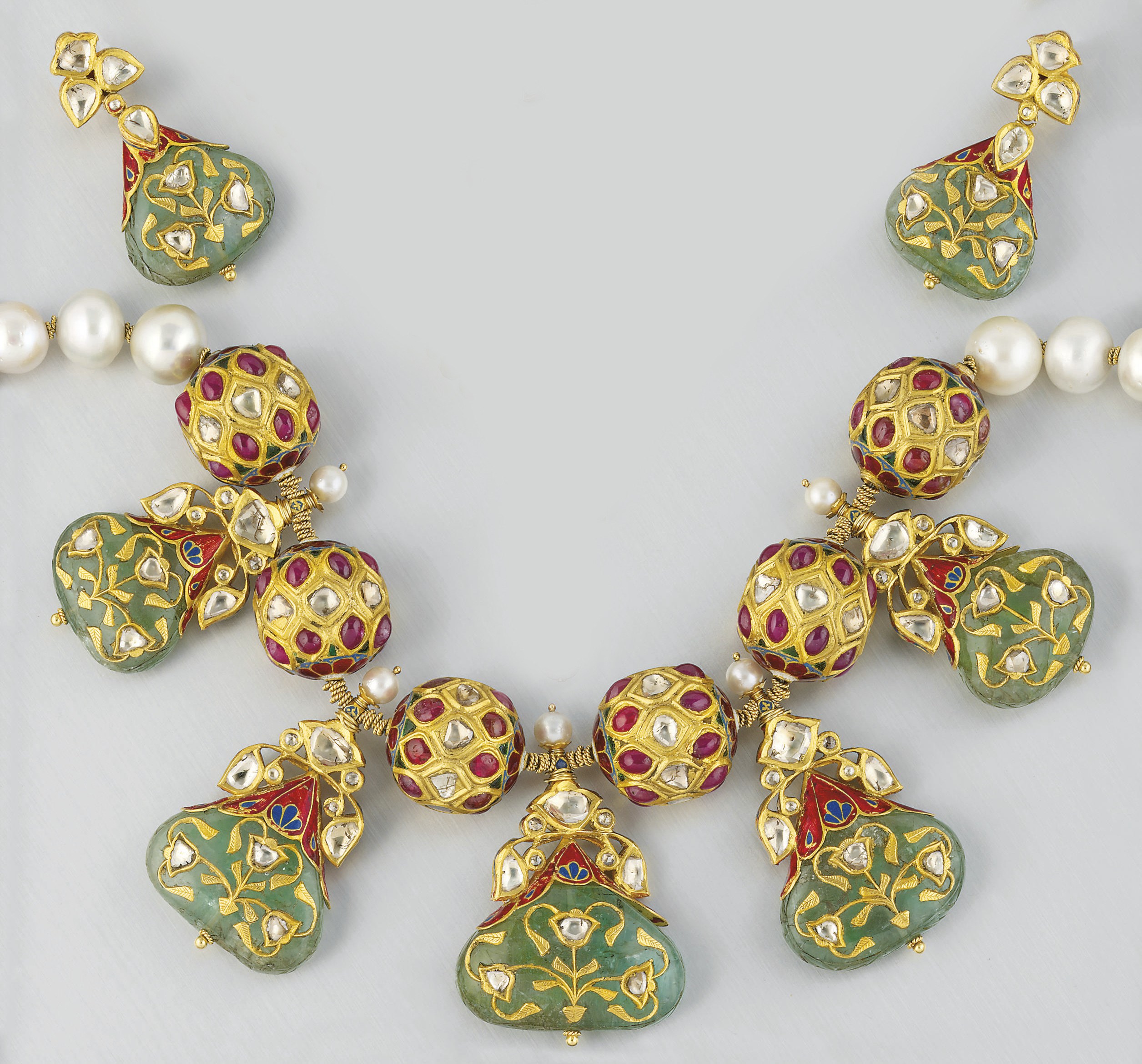 AN INDIAN CULTURED PEARL, DIAMOND, GEM AND ENAMEL NECKLACE AND A PAIR OF EARPENDANTS