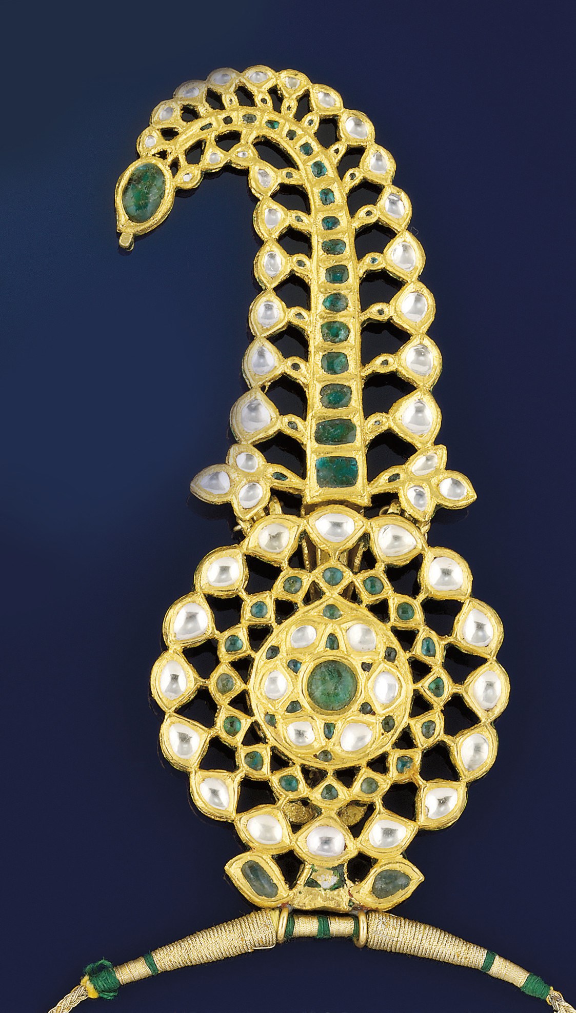 A 19TH CENTURY INDIAN FOILED EMERALD AND COLOURLESS SAPPHIRE SARPECH/PENDANT