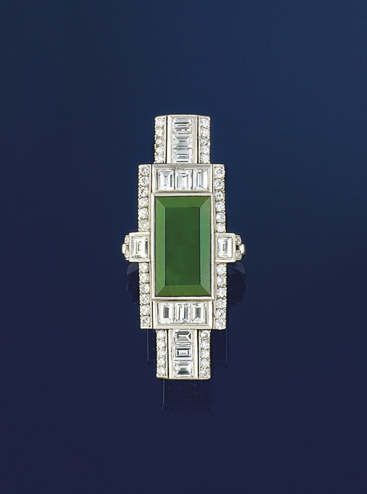 A JADEITE AND DIAMOND RING