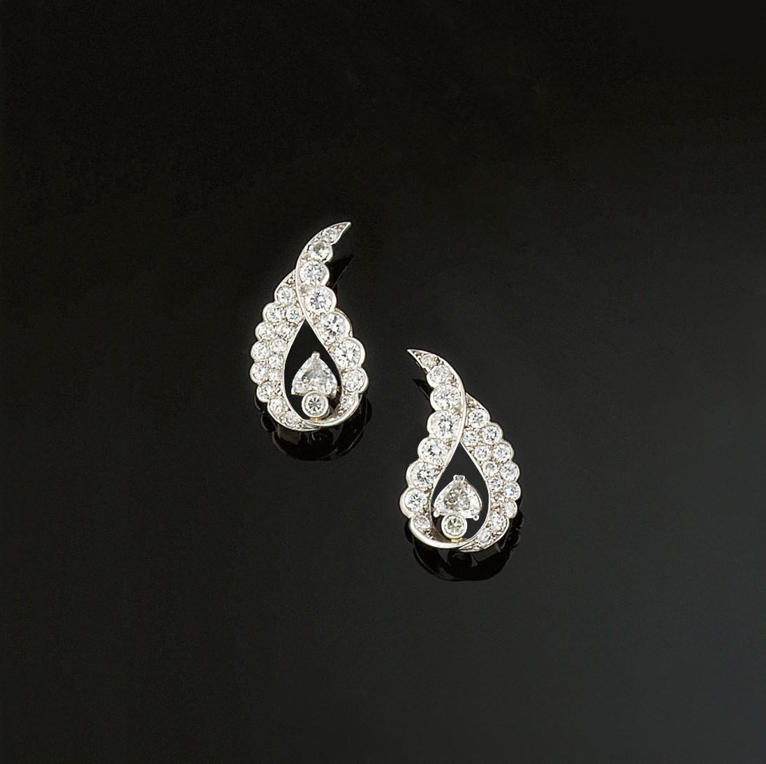 A pair of diamond earclips