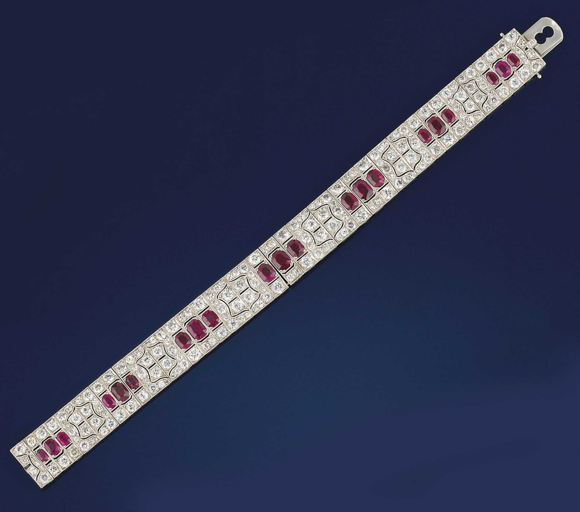 An Art Deco platinum, diamond and ruby bracelet