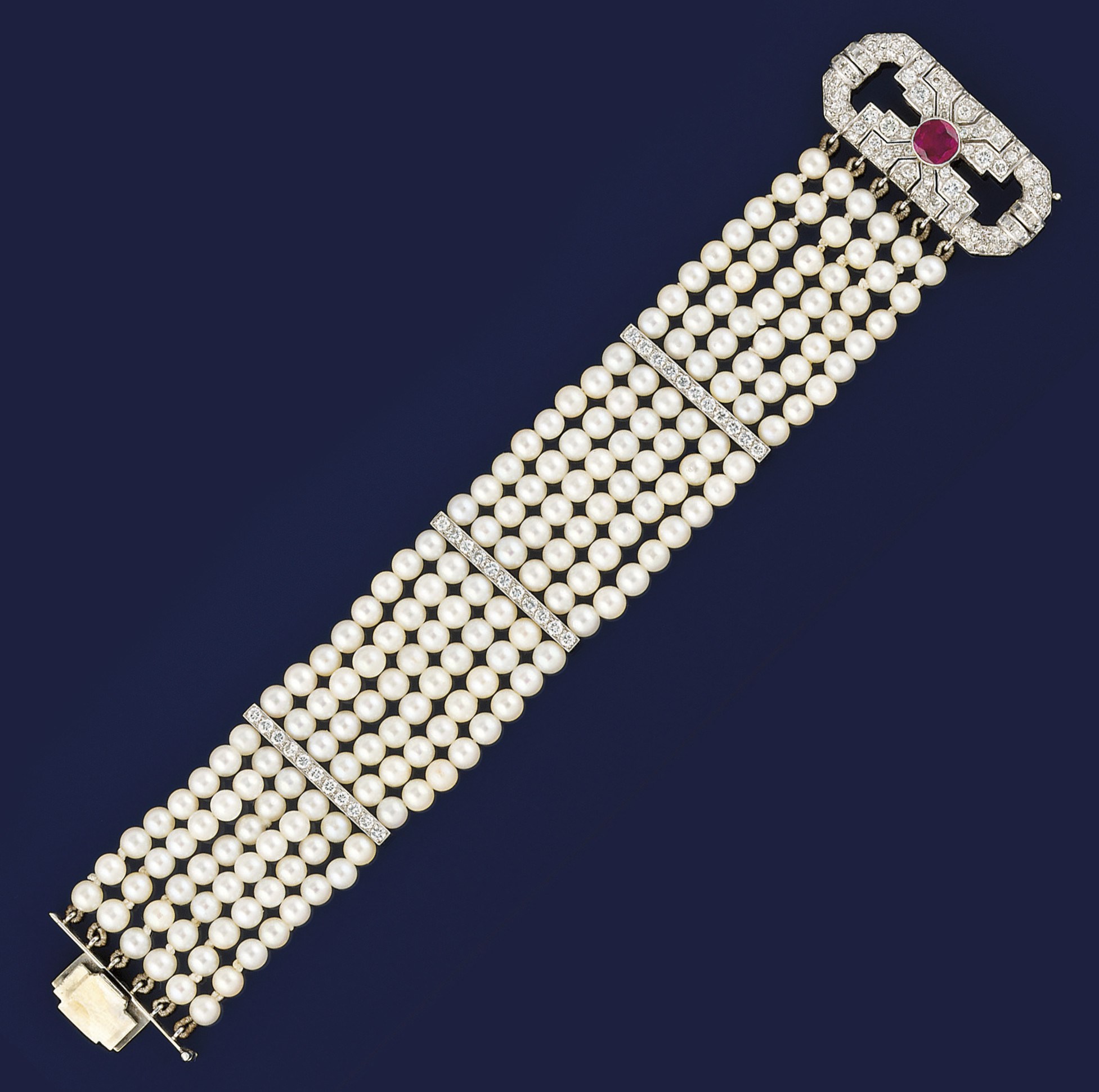 A diamond ruby and cultured pearl bracelet