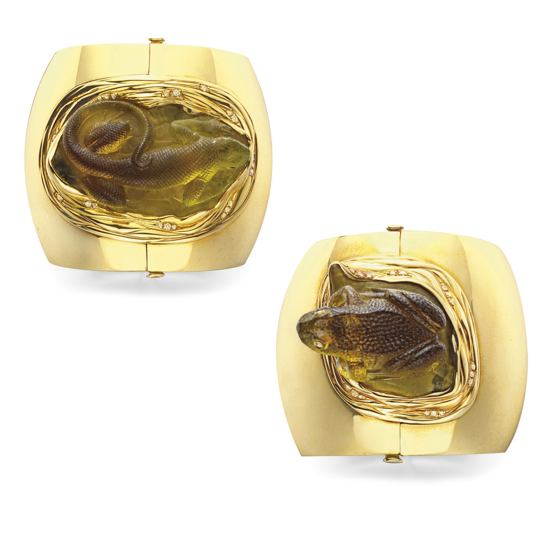 A PAIR OF PERIDOT AND GOLD CUFF BRACELETS
