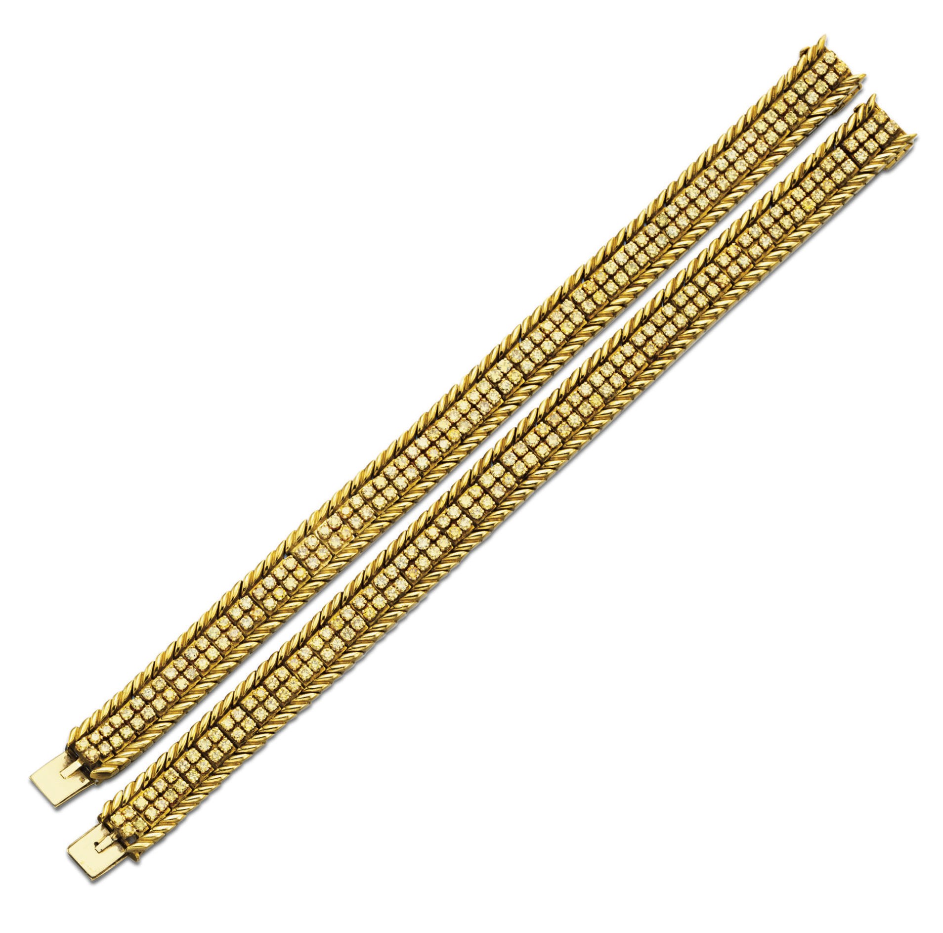 A PAIR OF COLORED DIAMOND AND GOLD BRACELETS, BY VERDURA