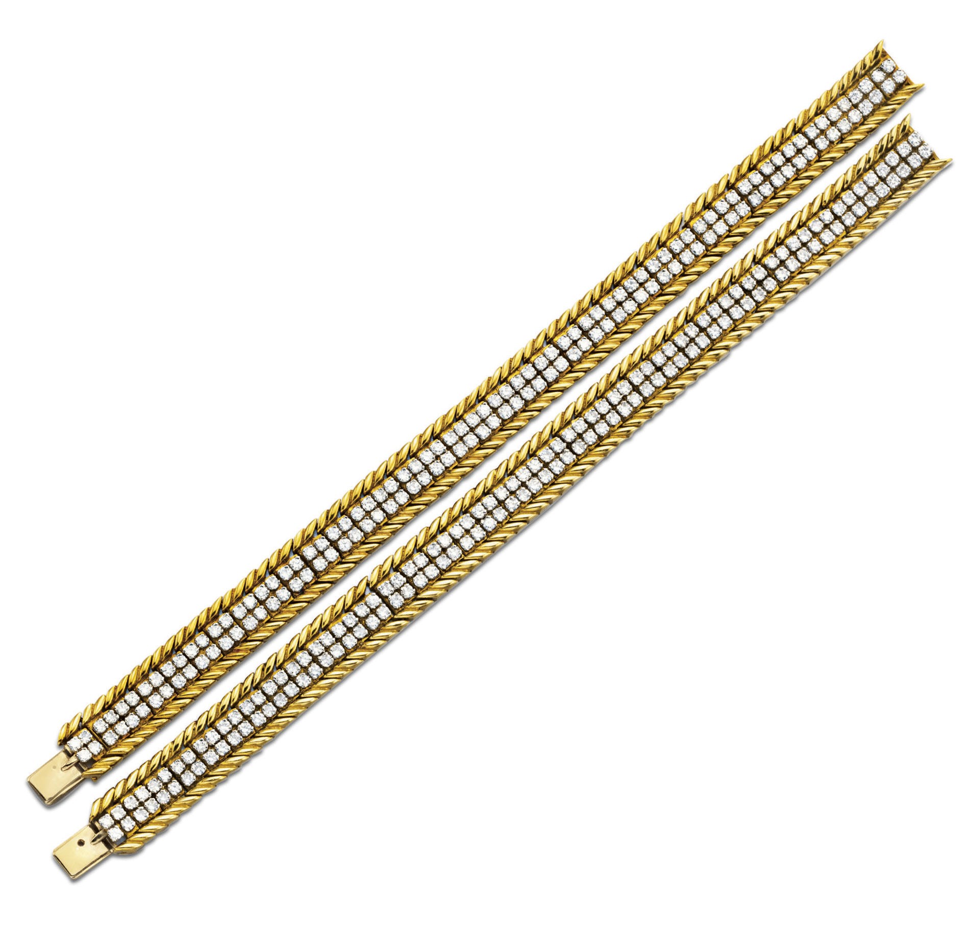 A PAIR OF DIAMOND AND GOLD BRACELETS, BY VERDURA
