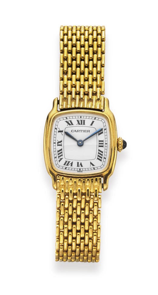 A GOLD WRISTWATCH, BY CARTIER