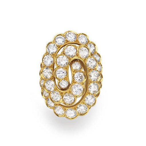 A DIAMOND AND GOLD RING, BY VAN CLEEF & ARPELS