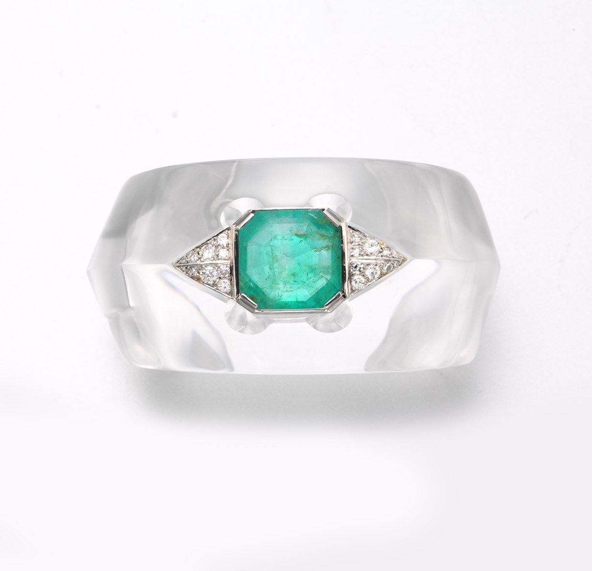 AN ART DECO EMERALD, DIAMOND AND ROCK CRYSTAL BRACELET, BY SUZANNE BELPERRON