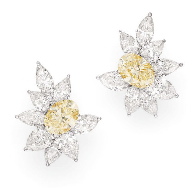 A PAIR OF COLORED DIAMOND EAR CLIPS