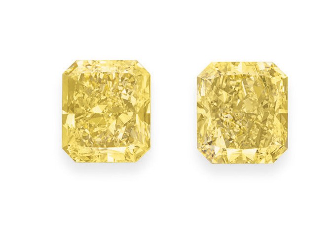A PAIR OF IMPRESSIVE COLORED DIAMOND EAR CLIPS