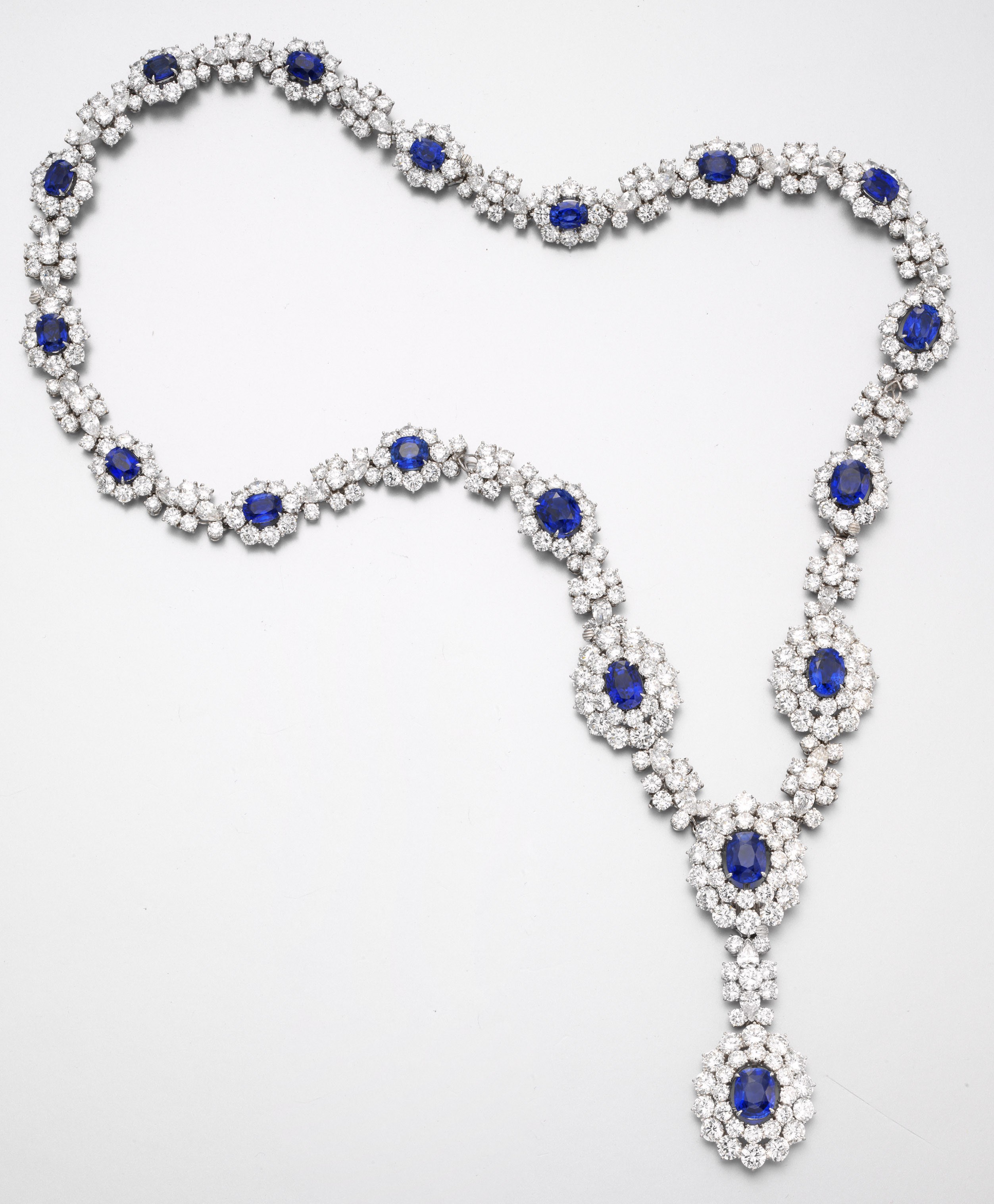 A DIAMOND AND SAPPHIRE PENDANT NECKLACE, BY VAN CLEEF & ARPELS