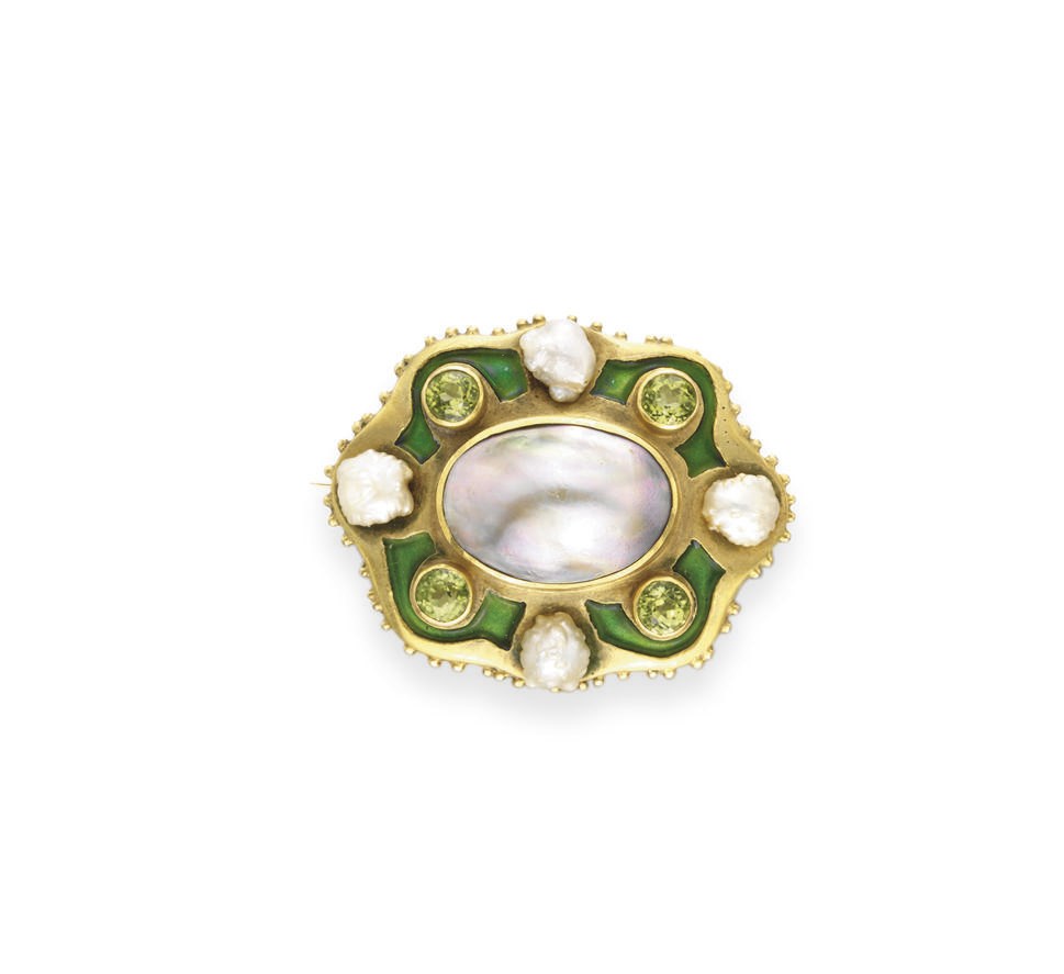 AN ART NOUVEAU MABE PEARL, PERIDOT AND ENAMEL BROOCH, BY MARCUS & CO.