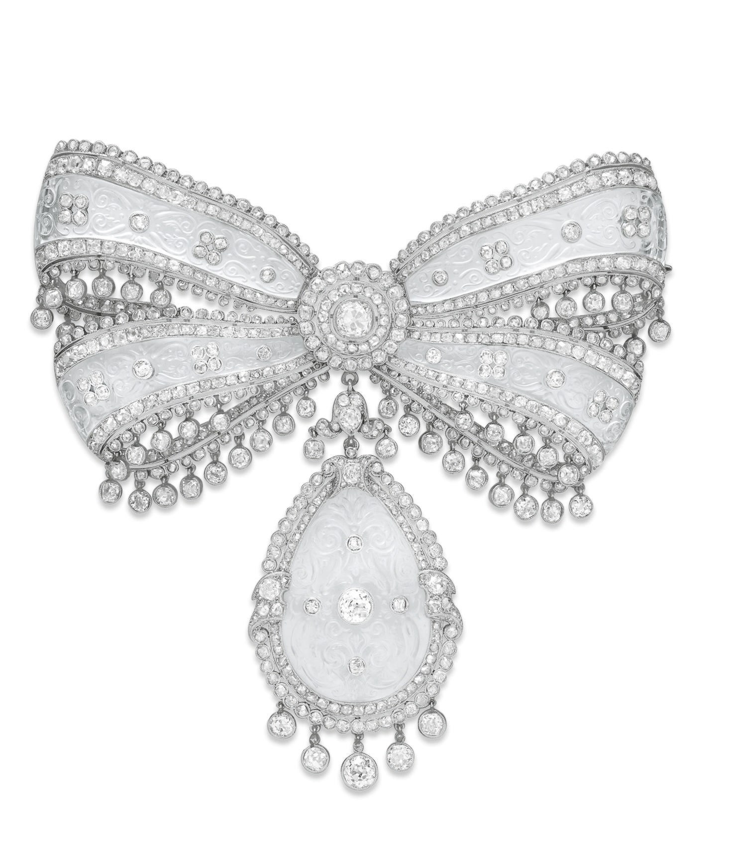 A SUPERB BELLE EPOQUE DIAMOND AND ROCK CRYSTAL BOW BROOCH, BY CARTIER
