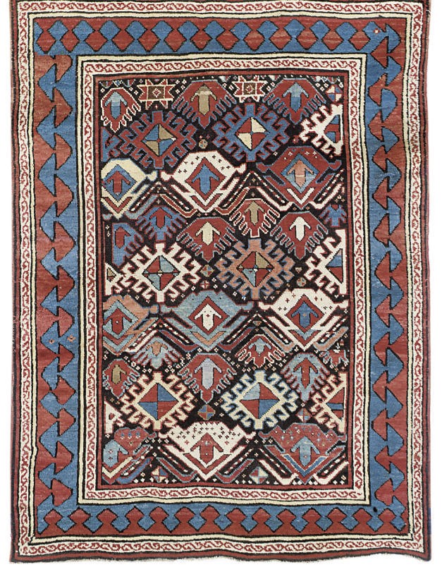 An antique Kazak rug