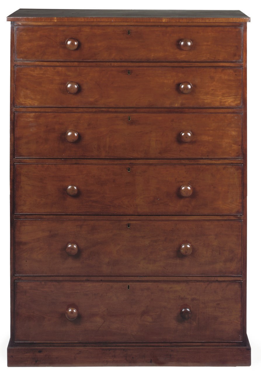 A MAHOGANY TALL CHEST OF DRAWERS