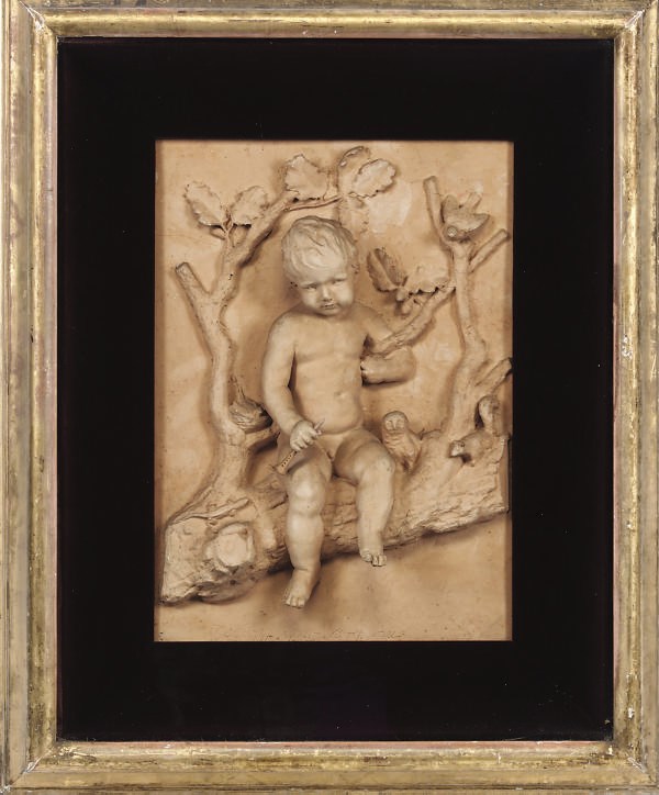 A FRAMED TERRACOTTA RELIEF PANEL
