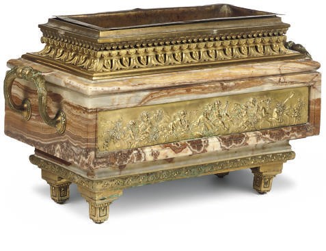 A FRENCH GILT BRONZE MOUNTED ONYX JARDINIERE