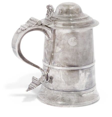 A GEORGE III SILVER TANKARD