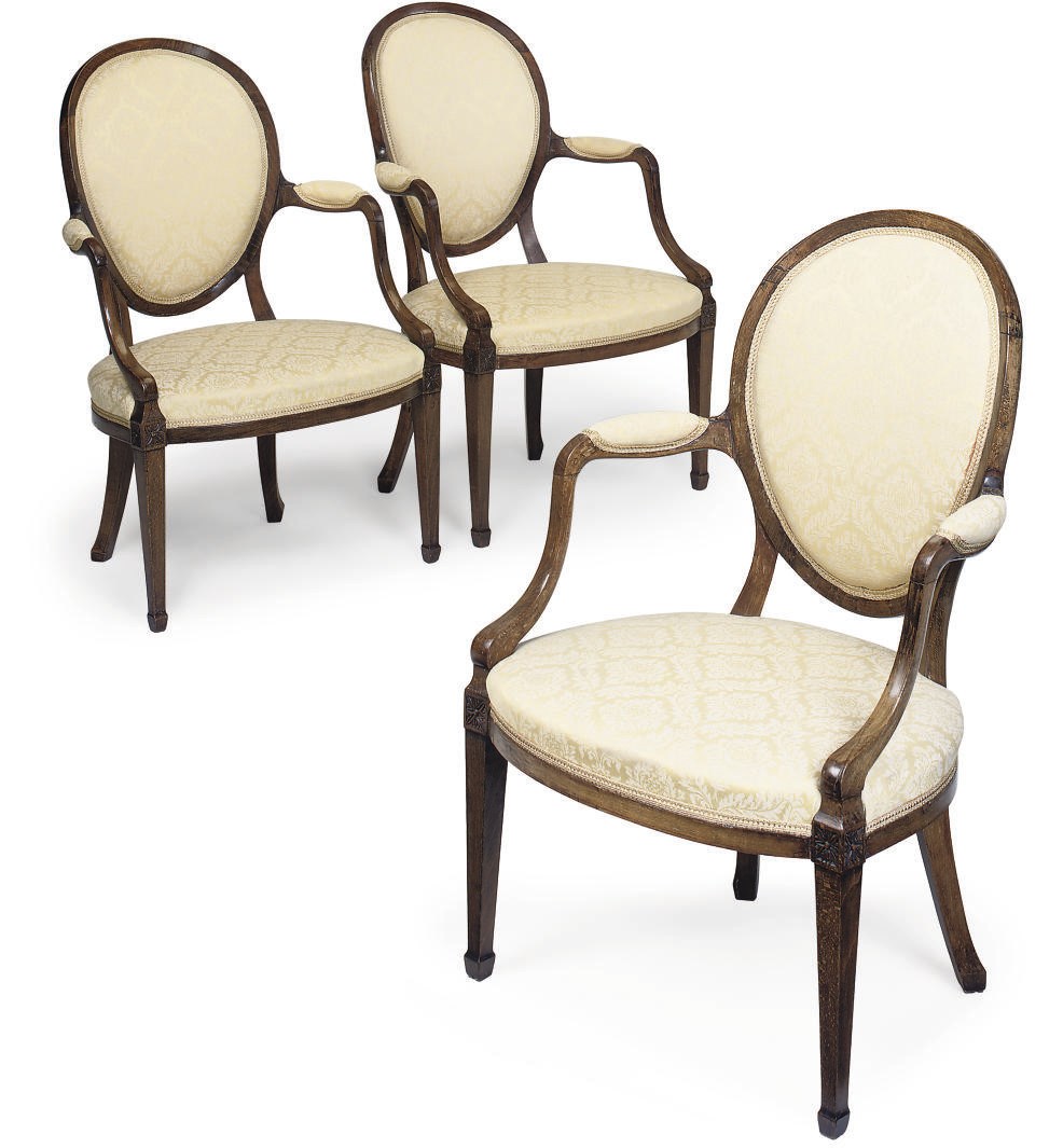 A SET OF THREE GEORGE III BEECH OPEN ARMCHAIRS