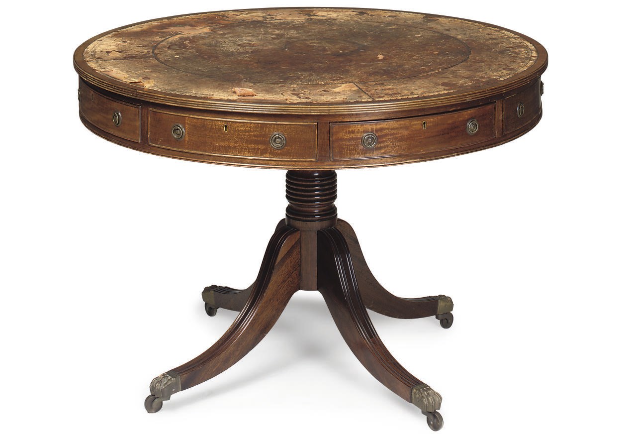 A MAHOGANY DRUM TABLE