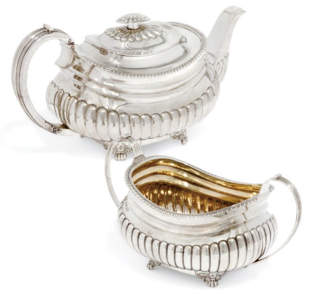 A GEORGE III SILVER TEAPOT AND A SUGAR BOWL EN SUITE