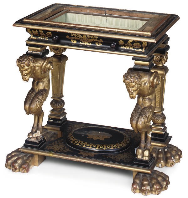 AN ITALIAN EBONISED AND PARCEL GILT CONSOLE TABLE