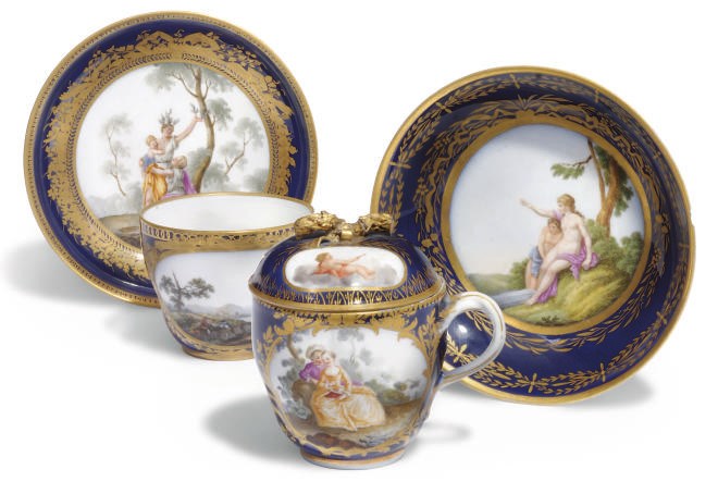 TWO MEISSEN (MARCOLINI) DARK-BLUE-GROUND CUPS AND SAUCERS AND A COVER