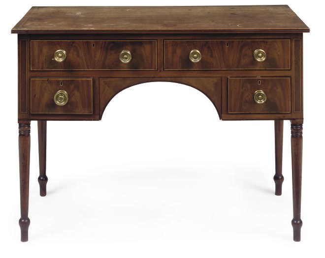 A REGENCY MAHOGANY LINE INLAID DRESSING TABLE
