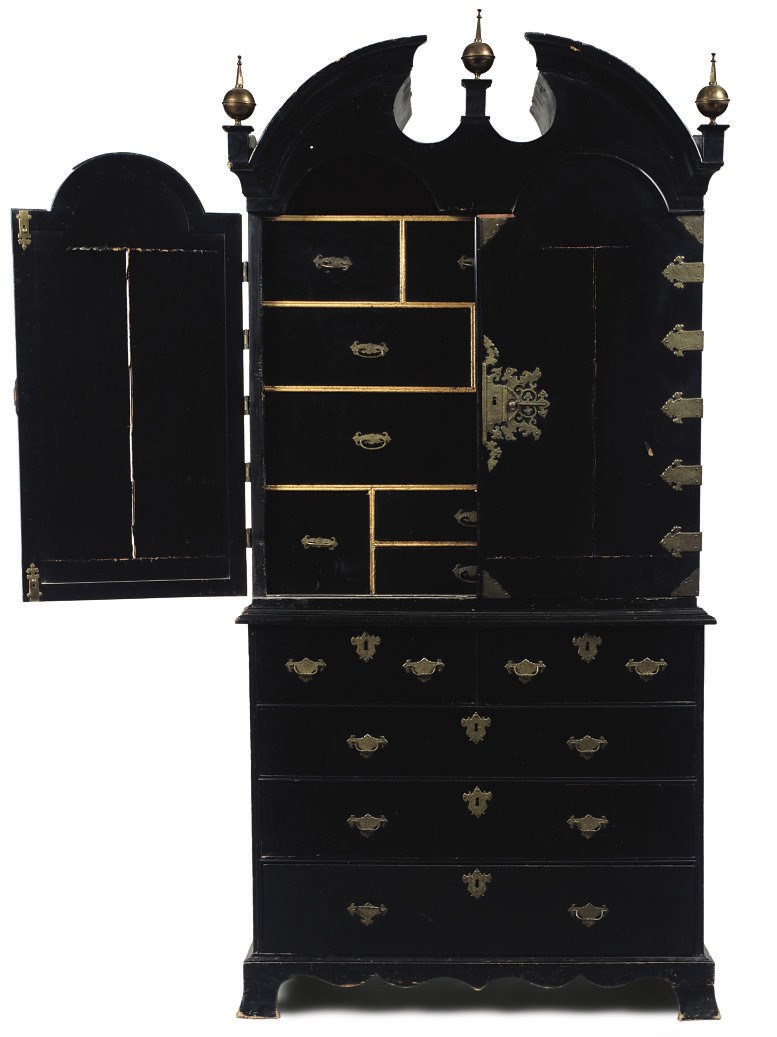 AN EBONISED BRASS MOUNTED CABINET ON CHEST
