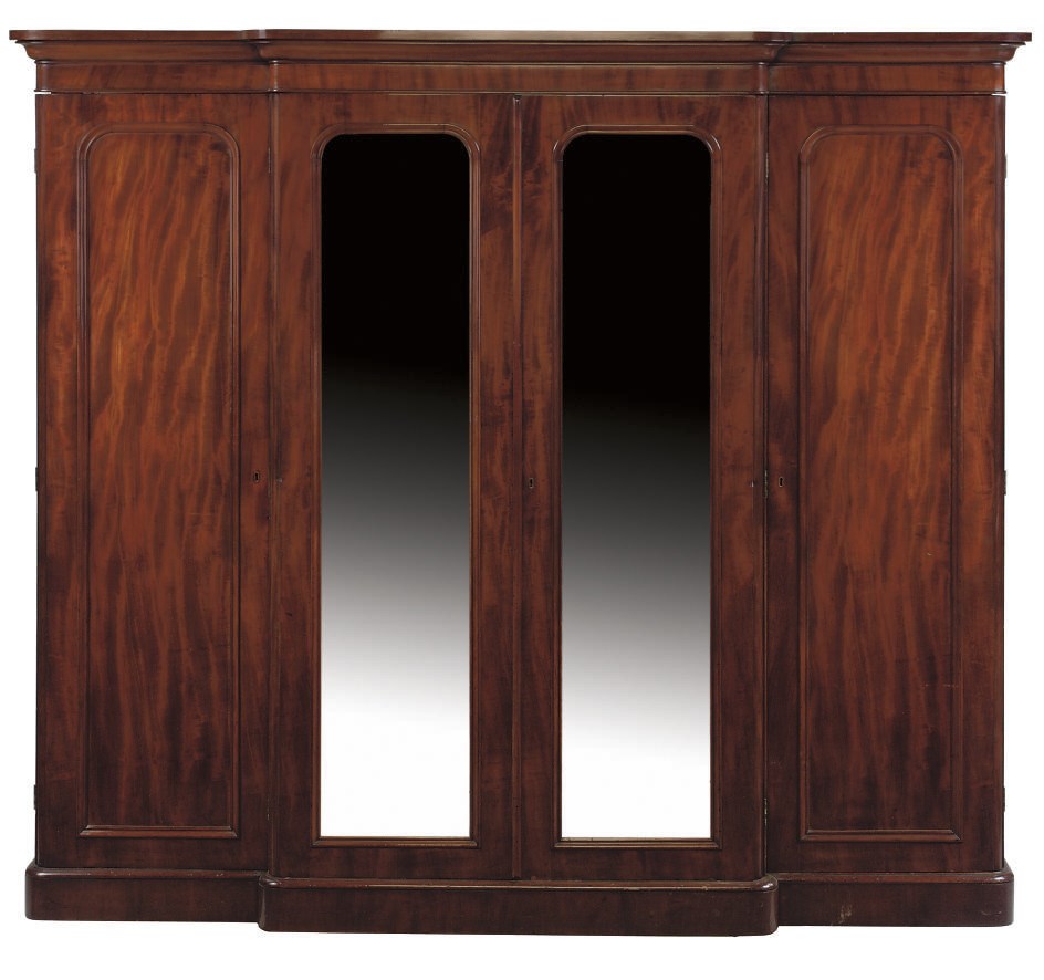 A MID VICTORIAN MAHOGANY TRIPLE SECTION BREAKFRONT WARDROBE