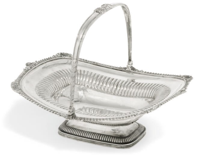 A GEORGE III SILVER SWING-HANDLED CAKE BASKET