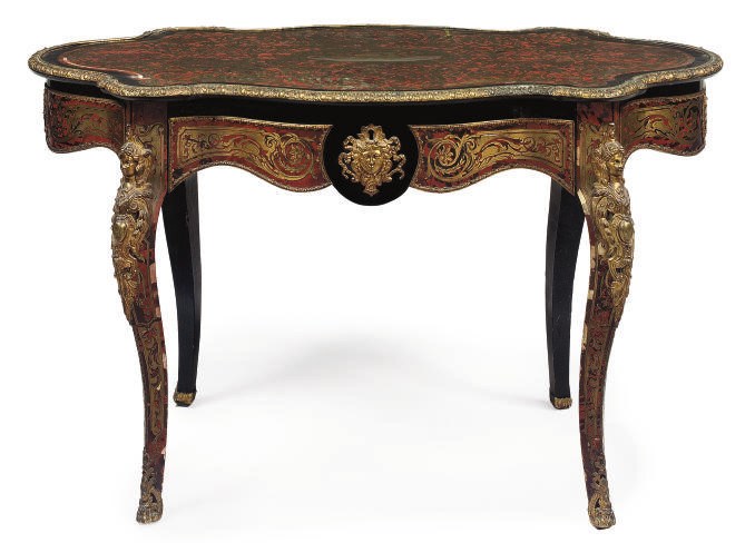 A NAPOLEON III GILT METAL MOUNTED, EBONISED AND BRASS INLAID TORTOISESHELL CENTRE TABLE