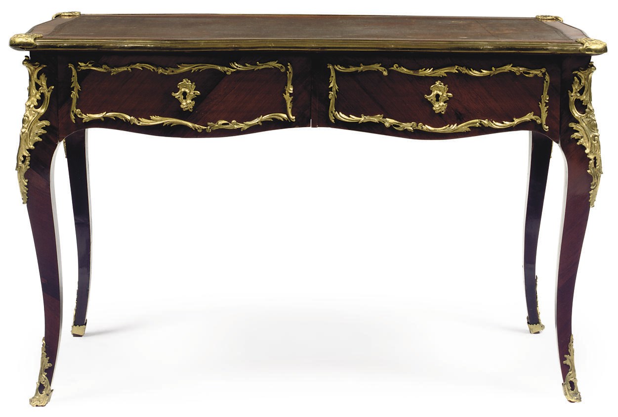 A FRENCH GILT METAL MOUNTED PALISANDER BUREAU PLAT