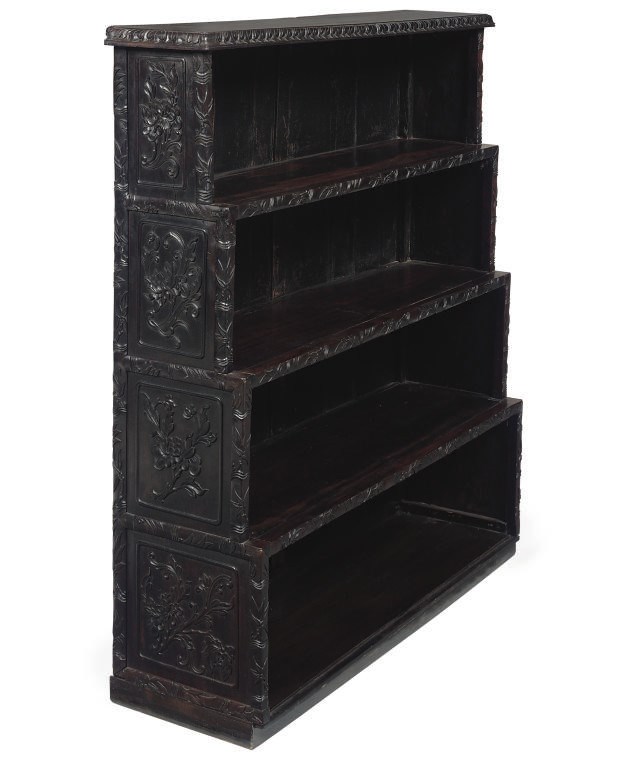 A  COLONIAL CARVED ROSEWOOD OPEN BOOKCASE
