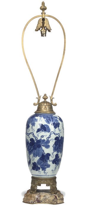 A GILT BRONZE MOUNTED BLUE AND WHITE CHINESE PORCELAIN LOBED TABLE LAMP