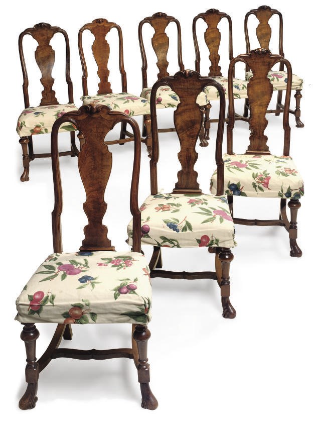 A SET OF EIGHT WALNUT DINING CHAIRS